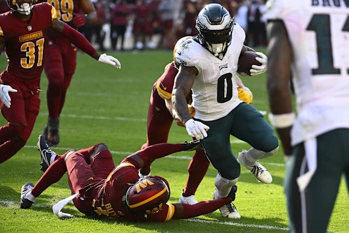 Oct 29, 2023; Landover, Maryland, USA; Philadelphia Eagles running back D'Andre Swift (0) carries the ball against the Washington Commanders during the second half at FedExField.